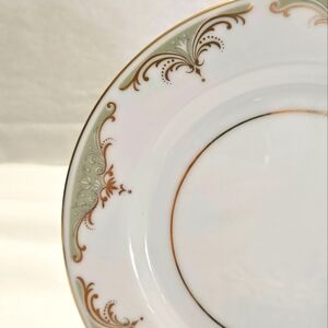 Set of 4 Mikasa "Valhala" bread and butter plates.